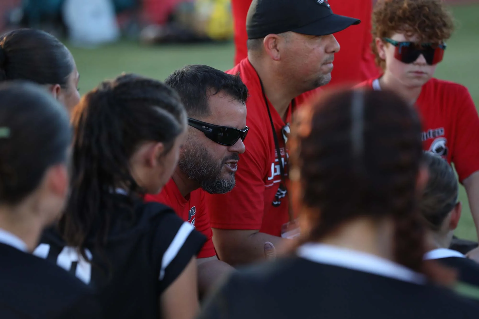Coach talking to the team